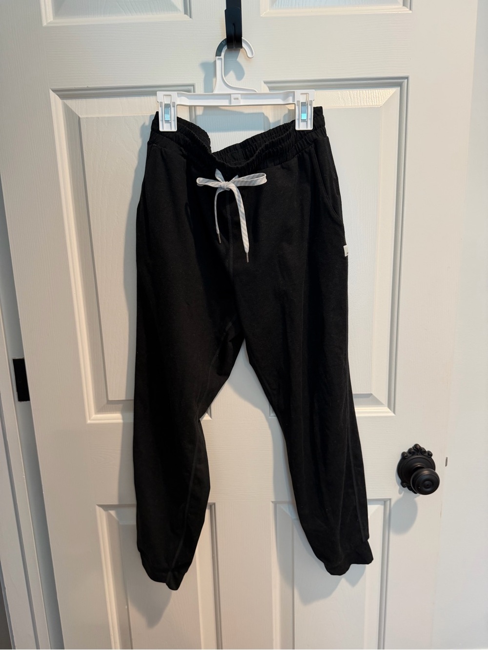 Vuori Black Heather Joggers with White Logo Patch